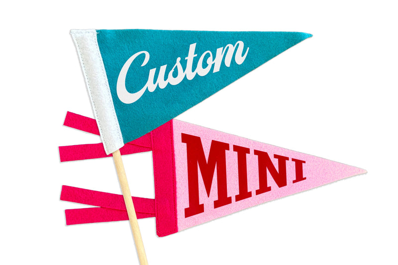 a mini pennant on a stick, and a mini pennant with felt ties, they say "Custom" and "Mini".
