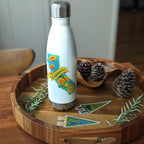 a white water bottle with a blue California shaped sticker that says "California"