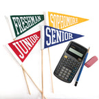 Flags labeled 'Freshman', 'Sophomore', 'Junior', and 'Senior' with a calculator and pencil on a white background.