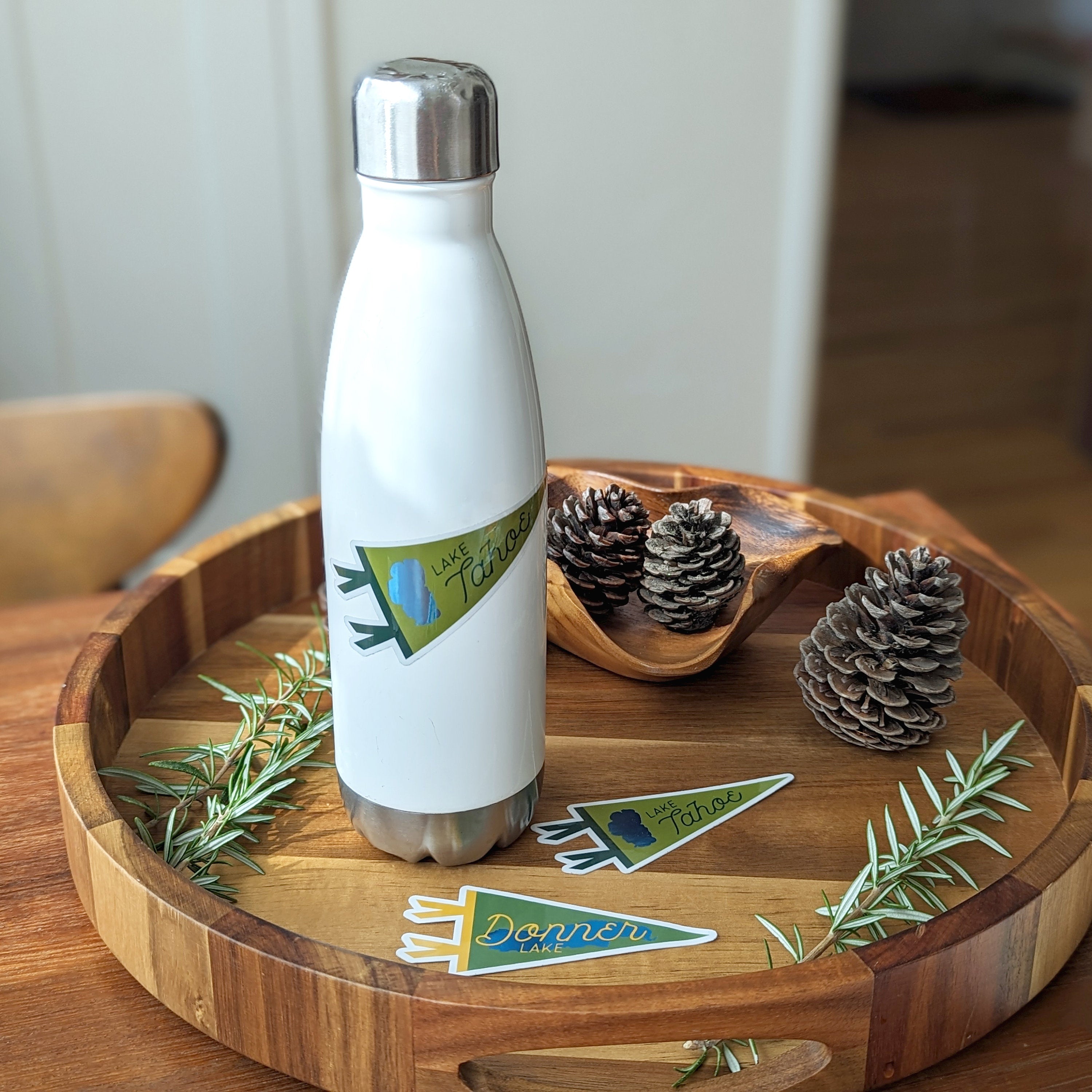 white water bottle with a Lake Tahoe sticker on it